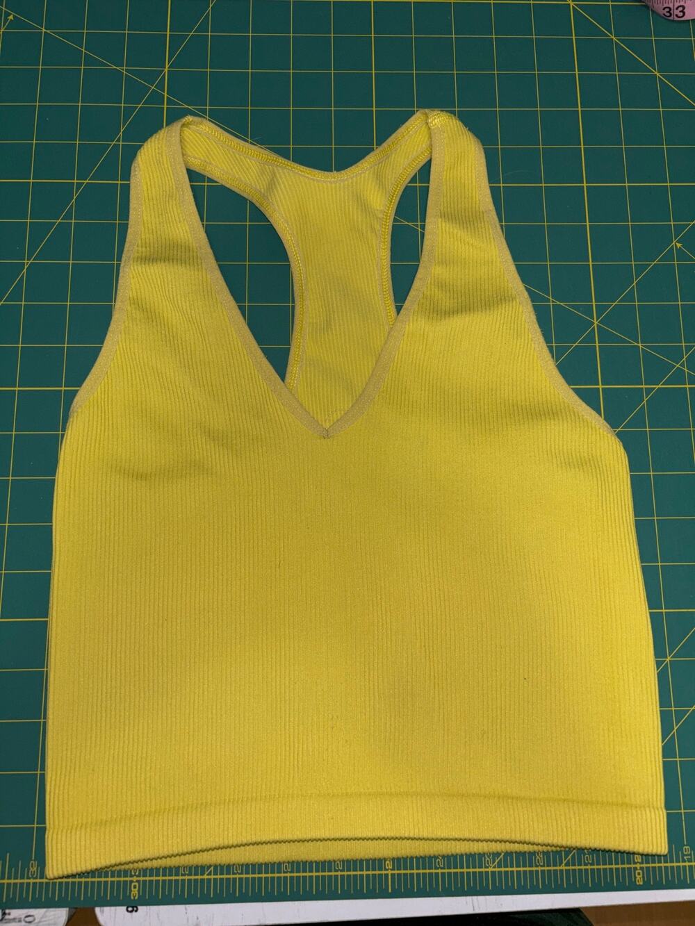 This is an FP Movement ribbed racerback crop tank/sports bra